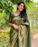 Mitera Green Woven Designer Party Wear Soft Silk Lichi Silk Saree .