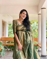 Mitera Green Woven Designer Party Wear Soft Silk Lichi Silk Saree .